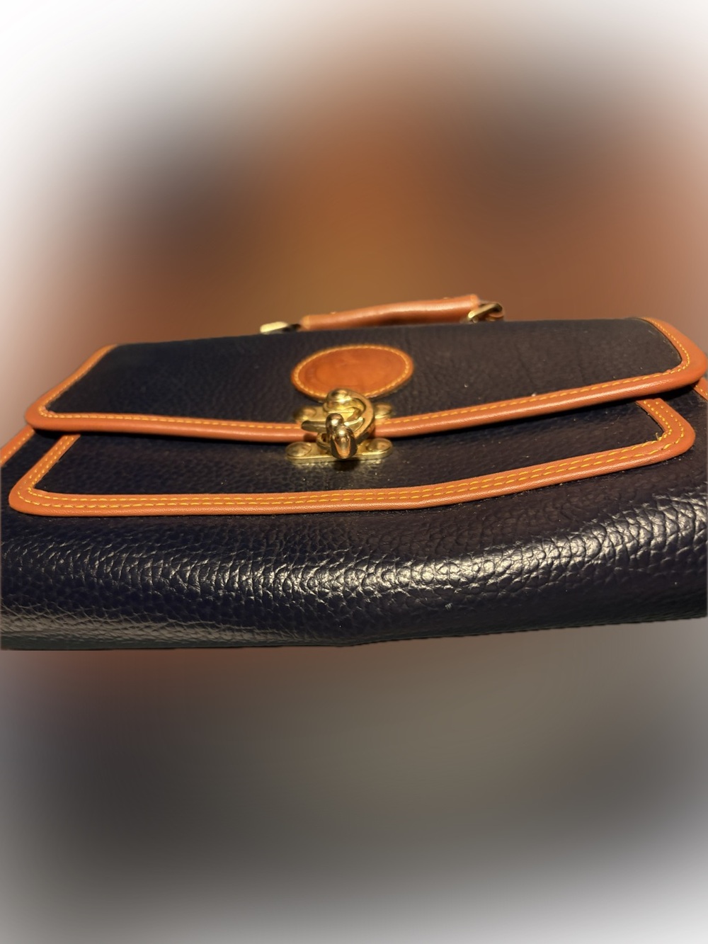 Dooney & Burke Textured Navy Blue Clutch with Tan Trim and Gold Hardware - Picture 3 of 7
